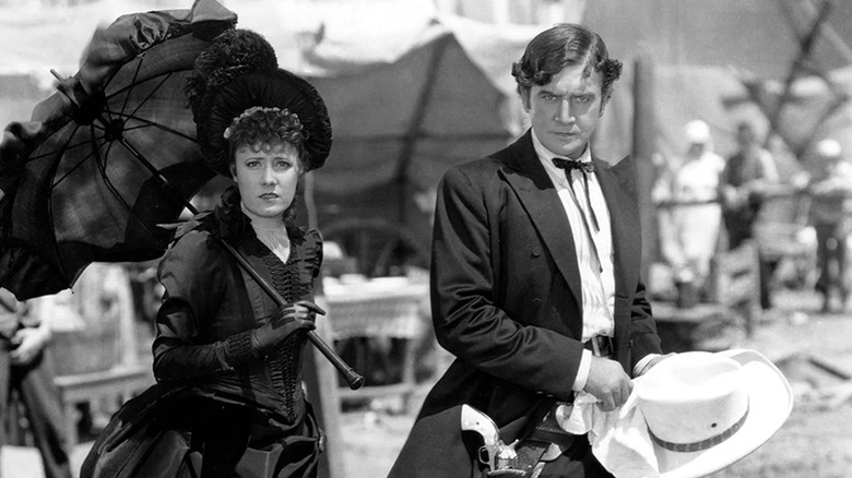 The two leads of Cimarron noticing something in the distance (1931)