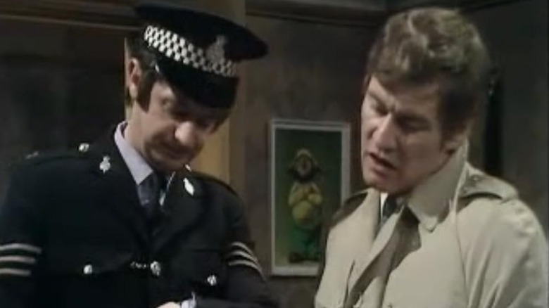 Skinner and Lynch looking down at something in Z-Cars (1962)