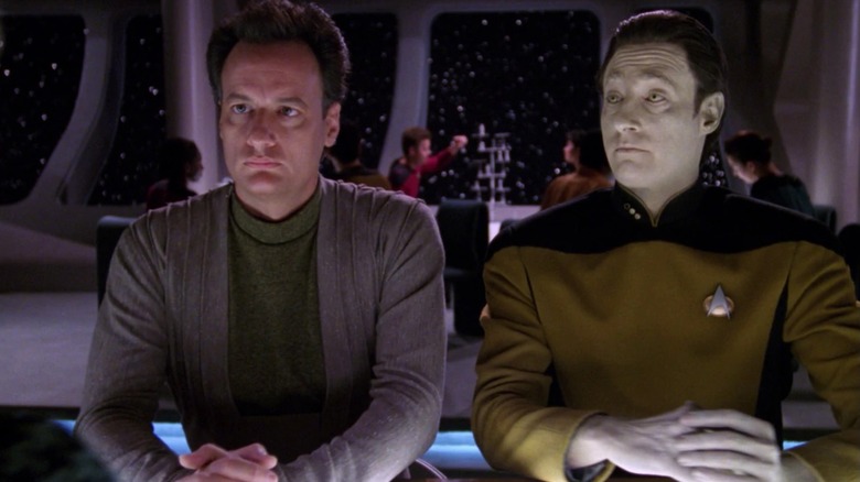 Q sitting at a bar with Data in "Star Trek: The Next Generation" (1987-1994)
