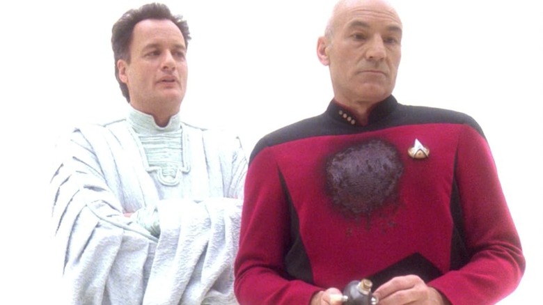 Q and Picard against a background of all white in "Star Trek: The Next Generation" (1987-1994)