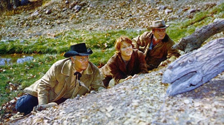 The three leads of Ride the High Country scoping on their adversaries from afar (1962)