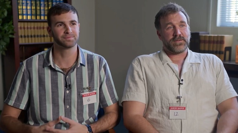 Ronald and Ross sitting side by side in Jury Duty (2023)