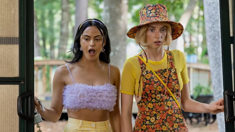 Drea and Eleanor opening a door and looking shocked in Do Revenge