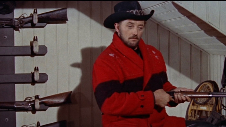 Curt Bridges in red jacket holding gun in Track of the Cat (1954)