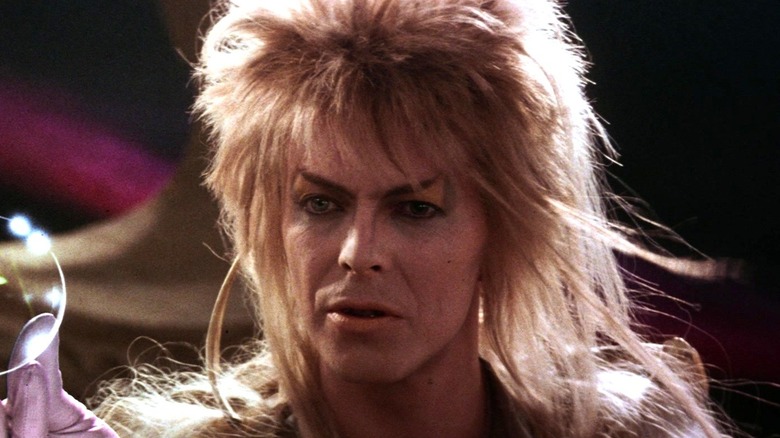 Jareth holding a crystal ball in Labyrinth