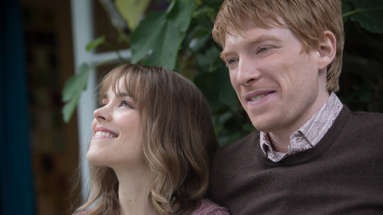 Mary and Tim sitting in their garden in About Time