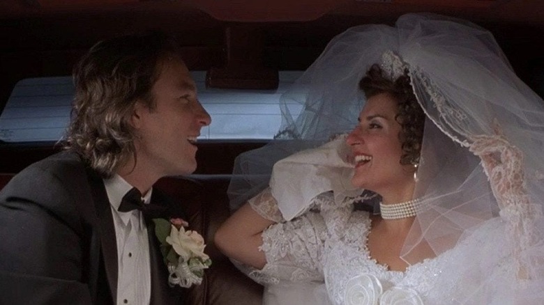 Ian and Toula laughing in their wedding limo in My Big Fat Greek Wedding