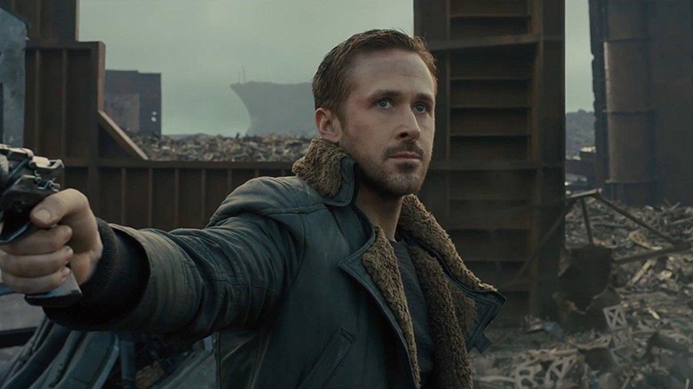 Officer K surveying dangerous terrain in "Blade Runner 2049"