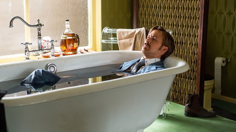 Holland March taking a fully clothed bath in "The Nice Guys"