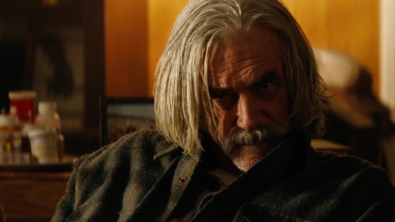 Lorne Lutch sitting down and looking disgruntled in Thank You for Smoking