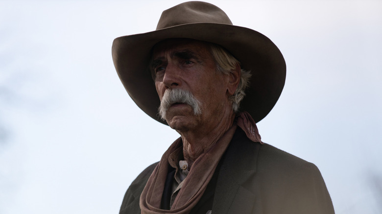 Shea Brennan looking tired and wearing a cowboy hat on 1883