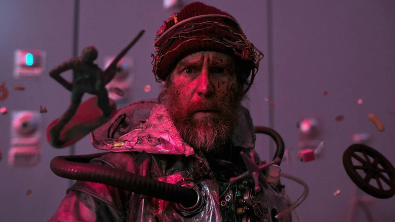 Man from the Future surrounded by debris in "Good Luck, Have Fun, Don't Die"