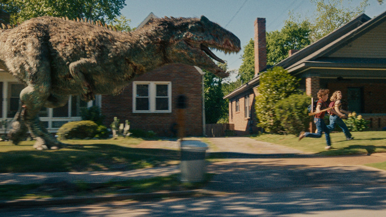 Dinosaur chasing Brian and Audrey in "The End of Oak Street"