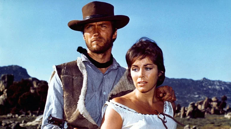 Joe with an arm on Marisol's shoulder in A Fistful of Dollars
