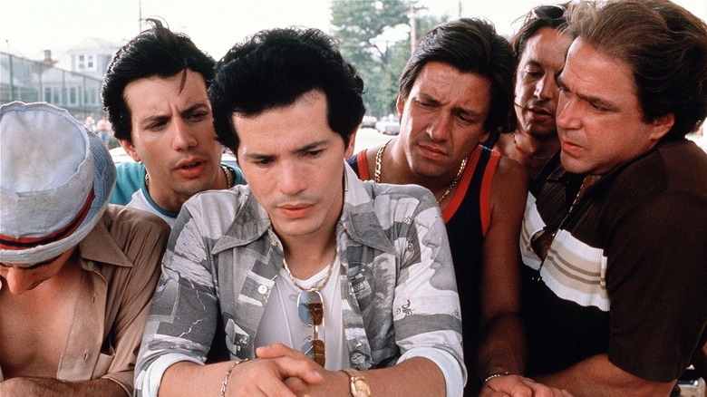 Woodstock, Bobby, Vinny, Brian, and Joey huddled together outside