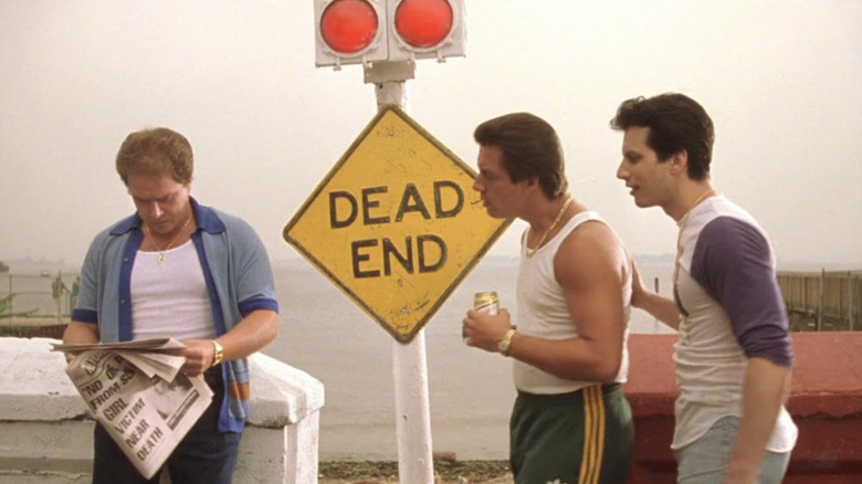 Three characters standing by a Dead End sign in "Summer of Sam"