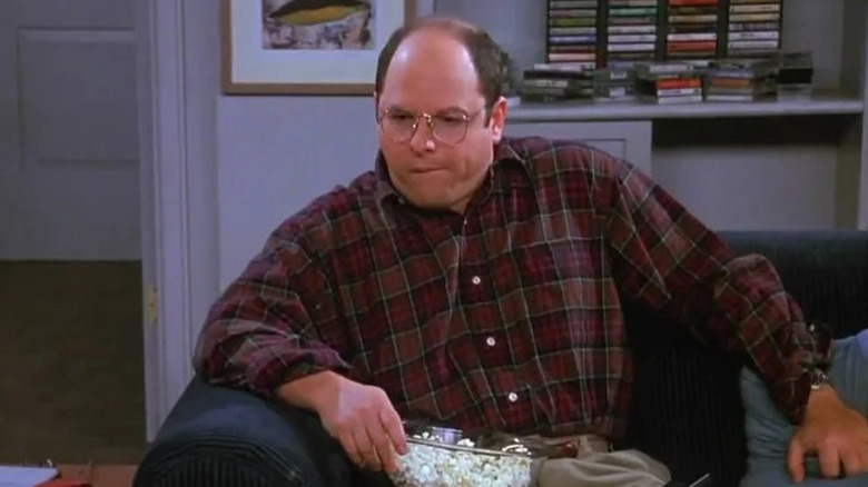 George Costanza with popcorn on Seinfeld