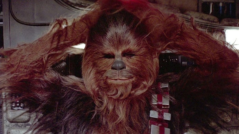 Chewbacca relishing his victory in Star Wars (1977)