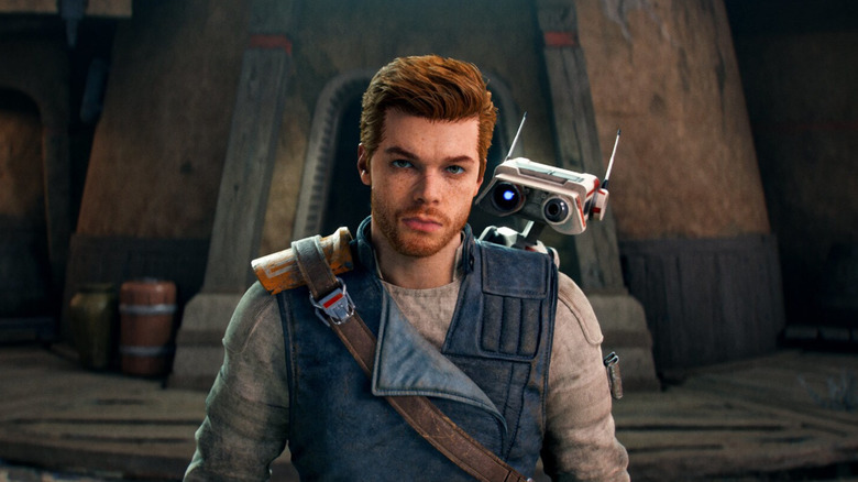 Cal Kestis looking at the camera with BD-1 on his shoulder in 