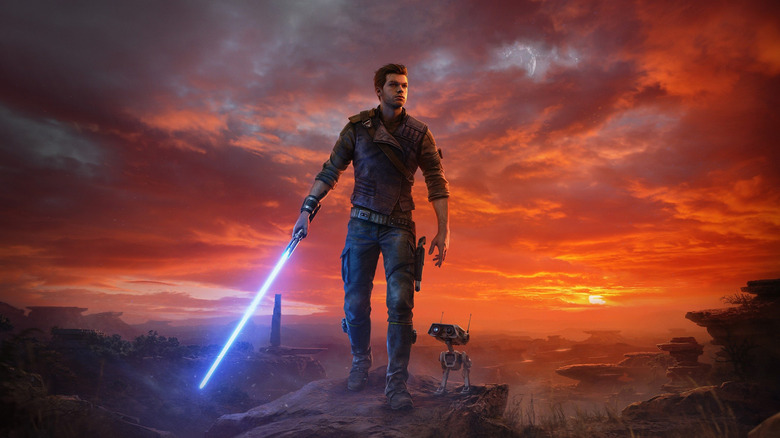 Cal Kestis and BD-1 standing against a beautiful sunset, blue lightsaber out, on the cover of Star Wars Jedi: Survivor (2023)