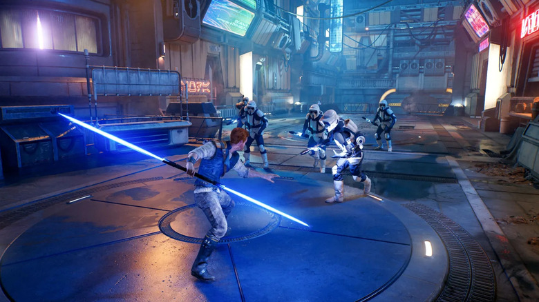 Cal Kestis brandishing a blue double-bladed lightsaber against a squad of Scout Troopers in Star Wars Jedi: Survivor (2023)