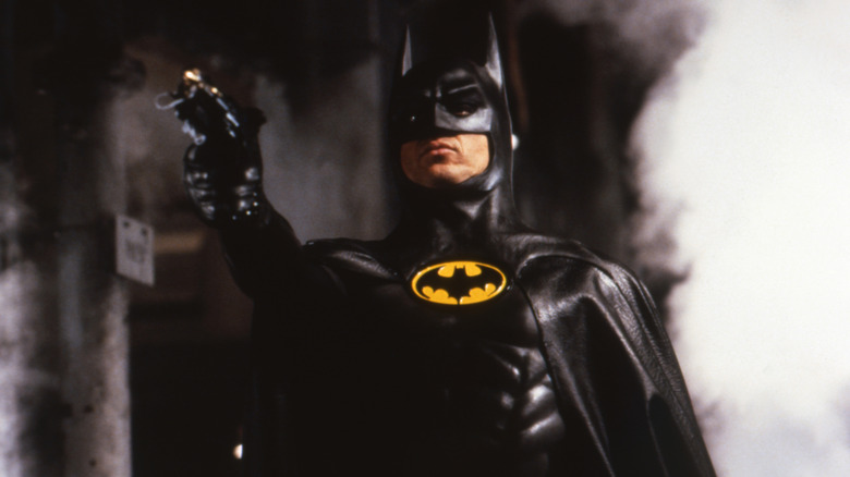 Batman about to use a grappling hook in Batman (1989)