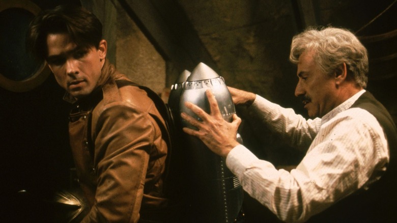 Peevy adjusts Cliff's jetpack in The Rocketeer (1991)