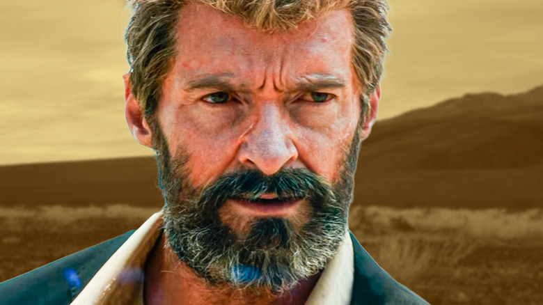 Logan/Wolverine with hills and a dusky sky behind him in 