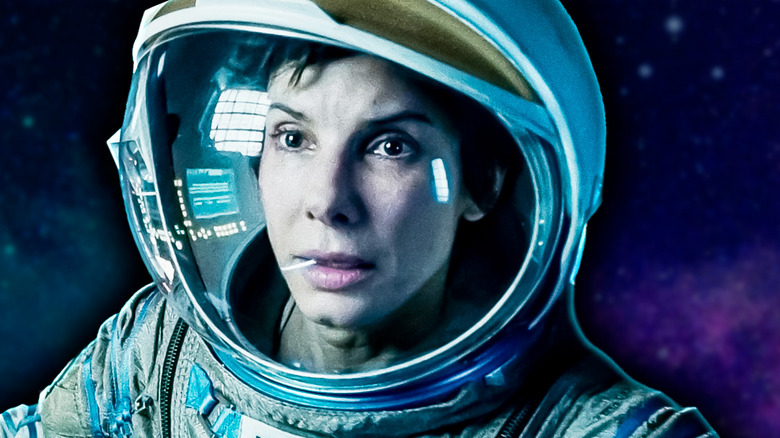 Close-up of Sandra Bullock as Ryan Stone in Gravity. Background of space from the movie