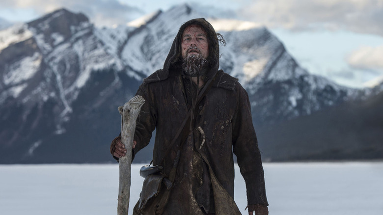 Hugh Glass navigating the landscape in The Revenant (2015)