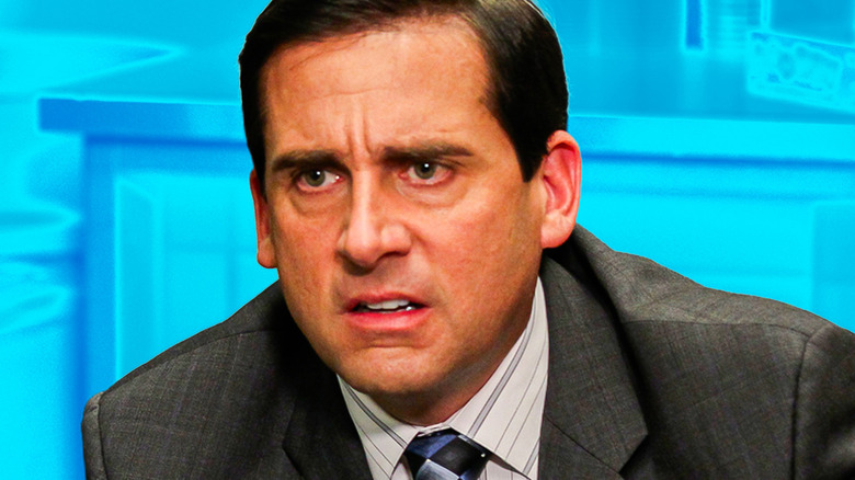 Michael Scott looking disgusted against a blue backdrop