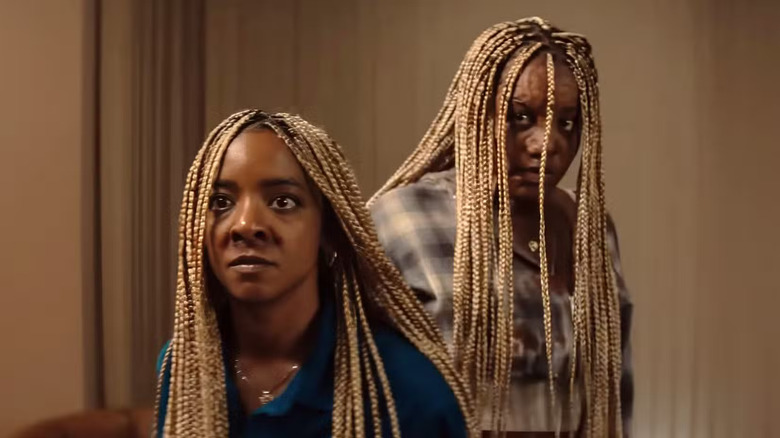 Racine and Anaia looking alarmed in Is God Is