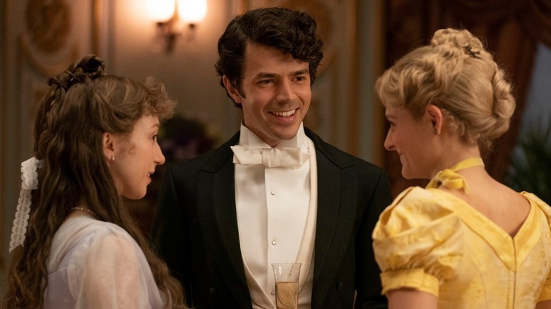 Larry talking with Marian and Gladys in "The Gilded Age"