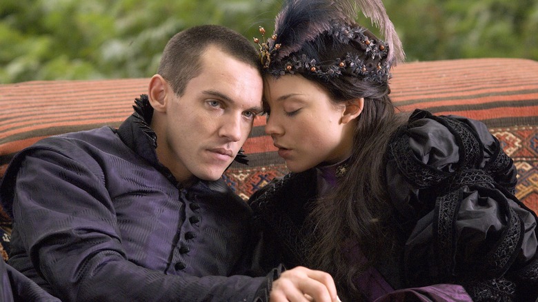 Henry and Anne cuddling in The Tudors