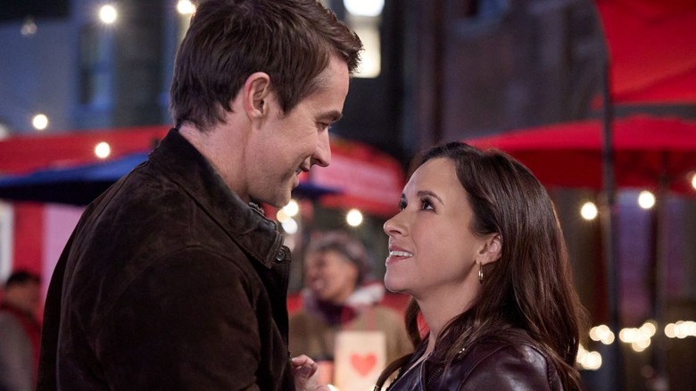 Finn and Hannah smile at one another in "An Unexpected Valentine" (2025)