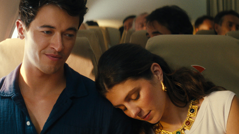 Poppy resting her head on Alex's shoulder in "People We Meet on Vacation" (2026)