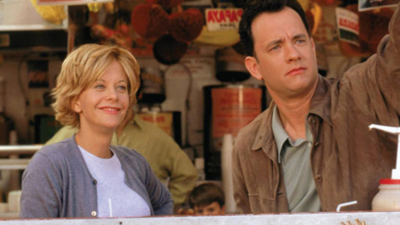 Kathleen smiles as Joe waves in "You've Got Mail" (1998)