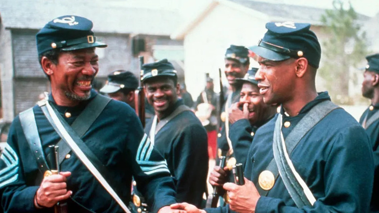 Rawlins and Trip talking in front of their men in Glory