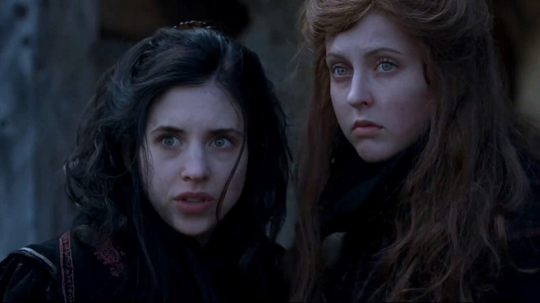 Brigitte and Ginger standing together in Ginger Snaps Back: The Beginning