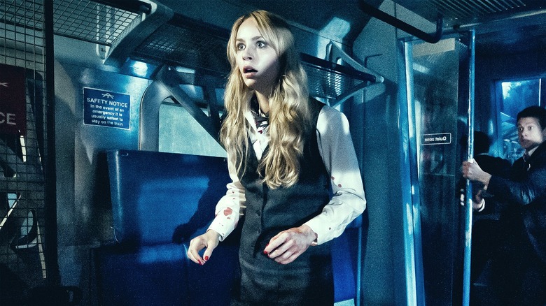 Ellen looking scared in the train in Howl
