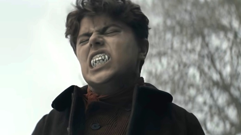 Timmy showing off silver fangs in The Cursed