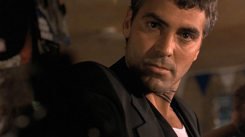 Seth Gecko robbing a convenience store in From Dusk till Dawn (1996)
