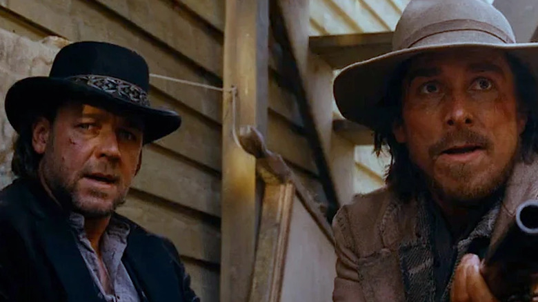 Ben Wade and Dan Evans under fire in "3:10 to Yuma" (2007)