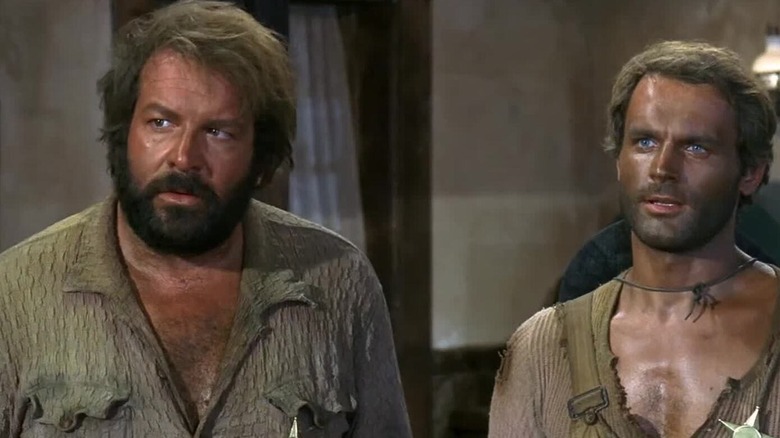 Bambino (Bud Spencer) and Trinity (Terence Hill) standing together in "Trinity Is Still My Name."
