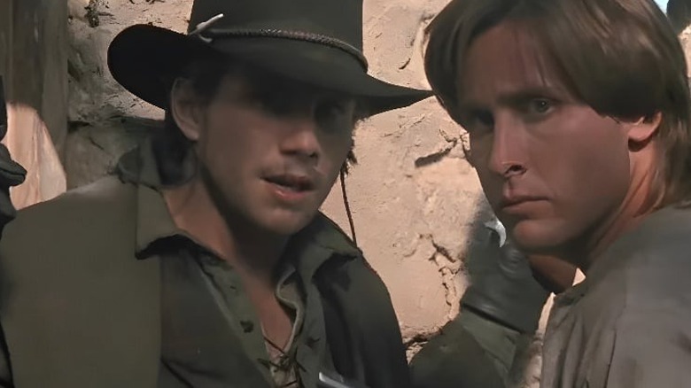Dave (Christian Slater) and Billy (Emilio Estevez) standing next to each other in "Young Guns II."