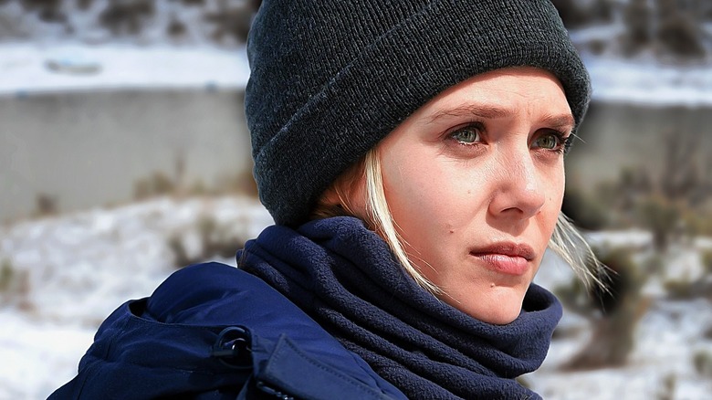 Jane in Wind River in front of snowy backdrop