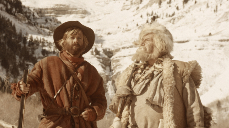 Jeremiah Johnson and Chris "Bear Claw" Lapp in the snow in Jeremiah Johnson