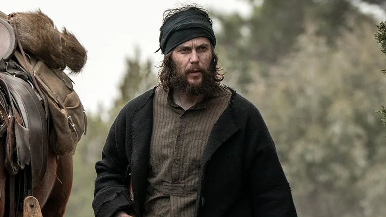 Isaac Reed wanders through the wilderness on American Primeval (2025)