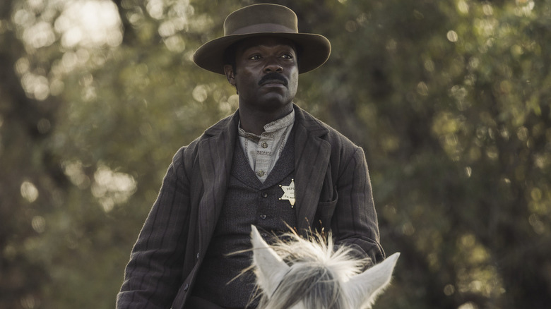 Bass Reeves on horseback on Lawmen: Bass Reeves (2023)