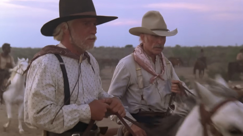 Woodrow Call and Gus McCrae on horseback on Lonesome Dove (1989)